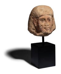 An Egyptian Painted Limestone Portrait Head of an Official