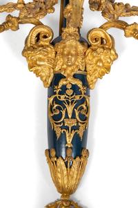 A Pair of Louis XVI Style Part Ebonized and Gilt-Bronze Three-Light Sconces
