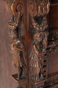 An Italian Renaissance Revival Carved Walnut Chest of Drawers