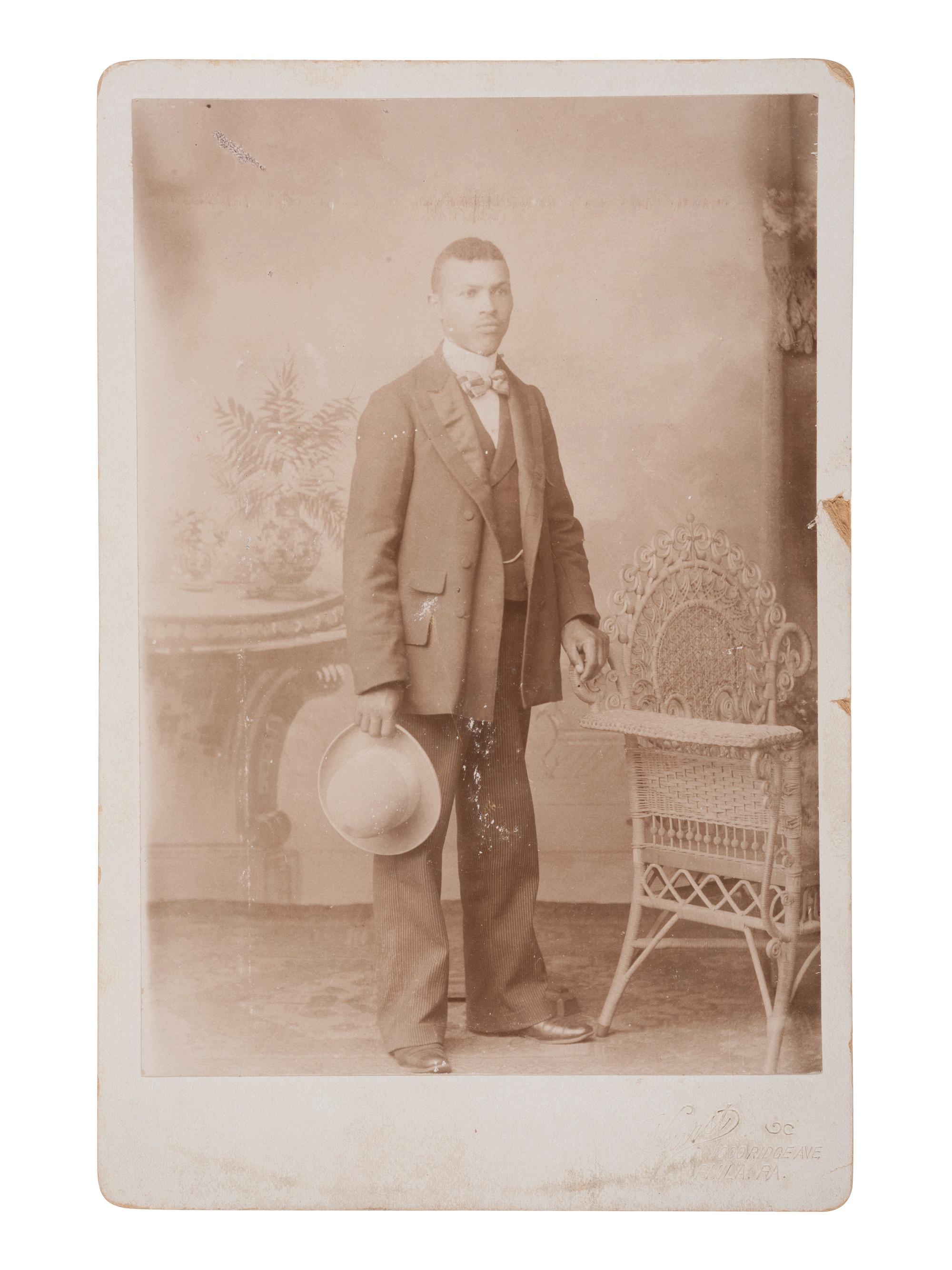 [EARLY PHOTOGRAPHY]. 6 photos of African American subjects, incl. sixth plate tintype of young man.