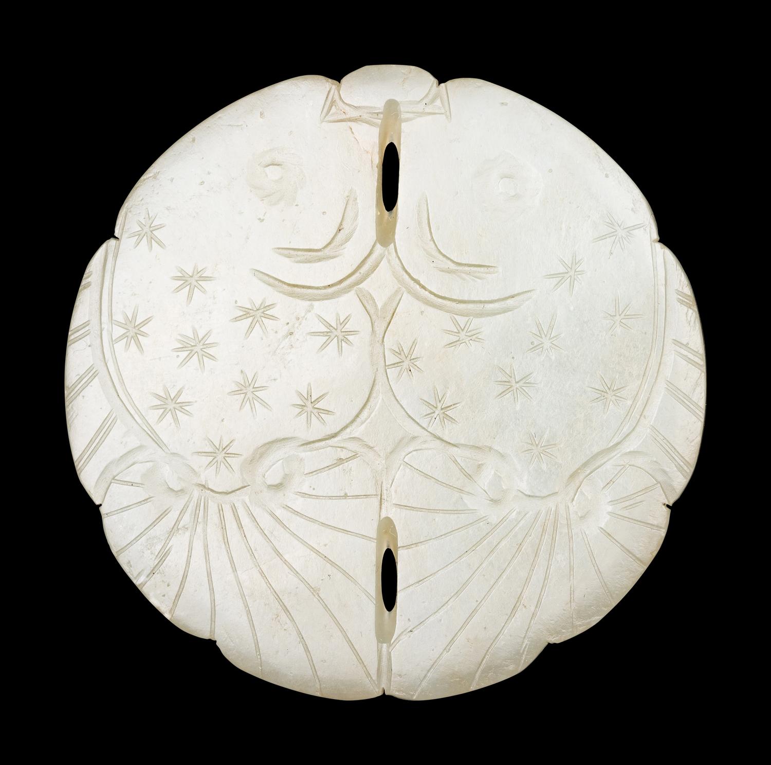 Three Pale Celadon Jade Pendants