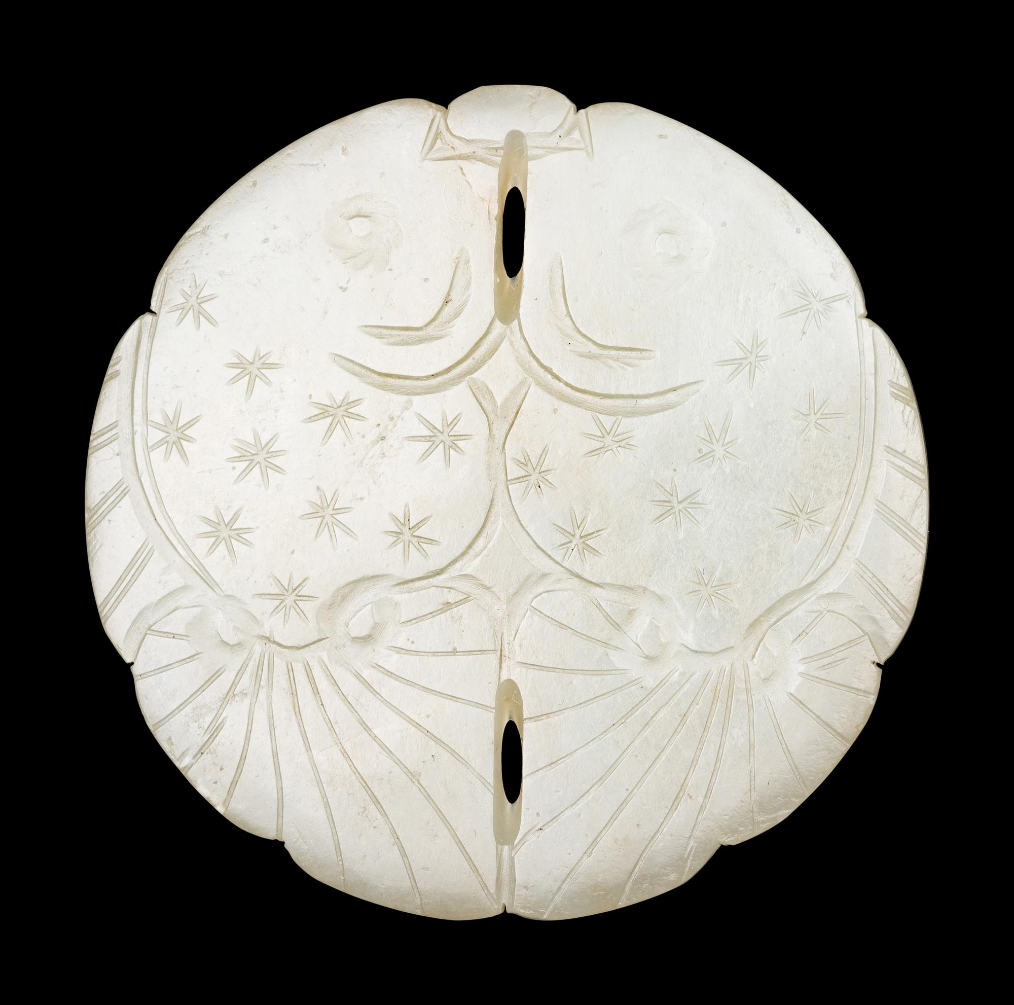 Three Pale Celadon Jade Pendants