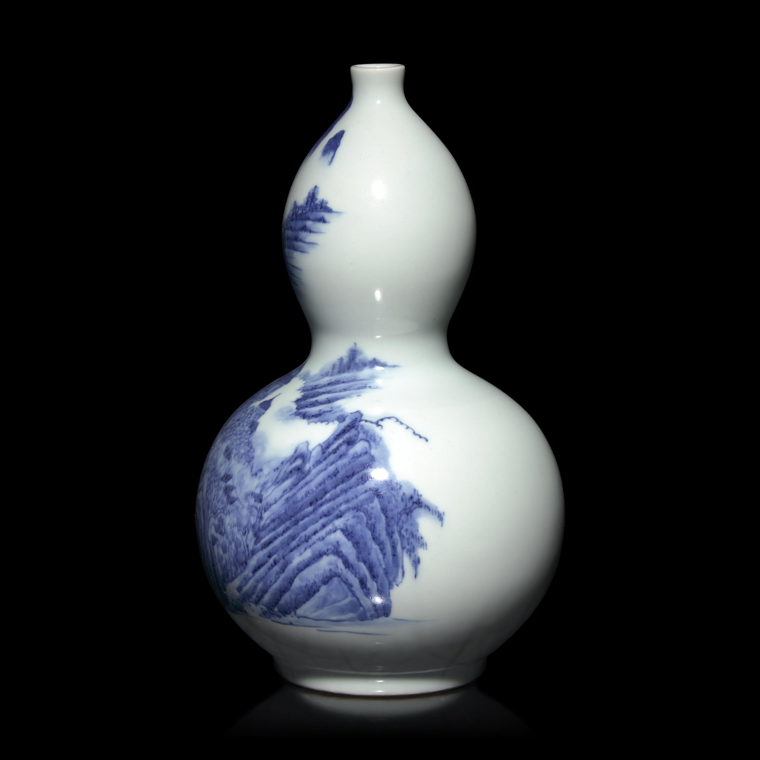 A Japanese Hirado Blue and White Double-Gourd Vase, Edo to Early Meiji Period — 日本江戶-明治早期 平戶燒青花山水圖葫蘆瓶