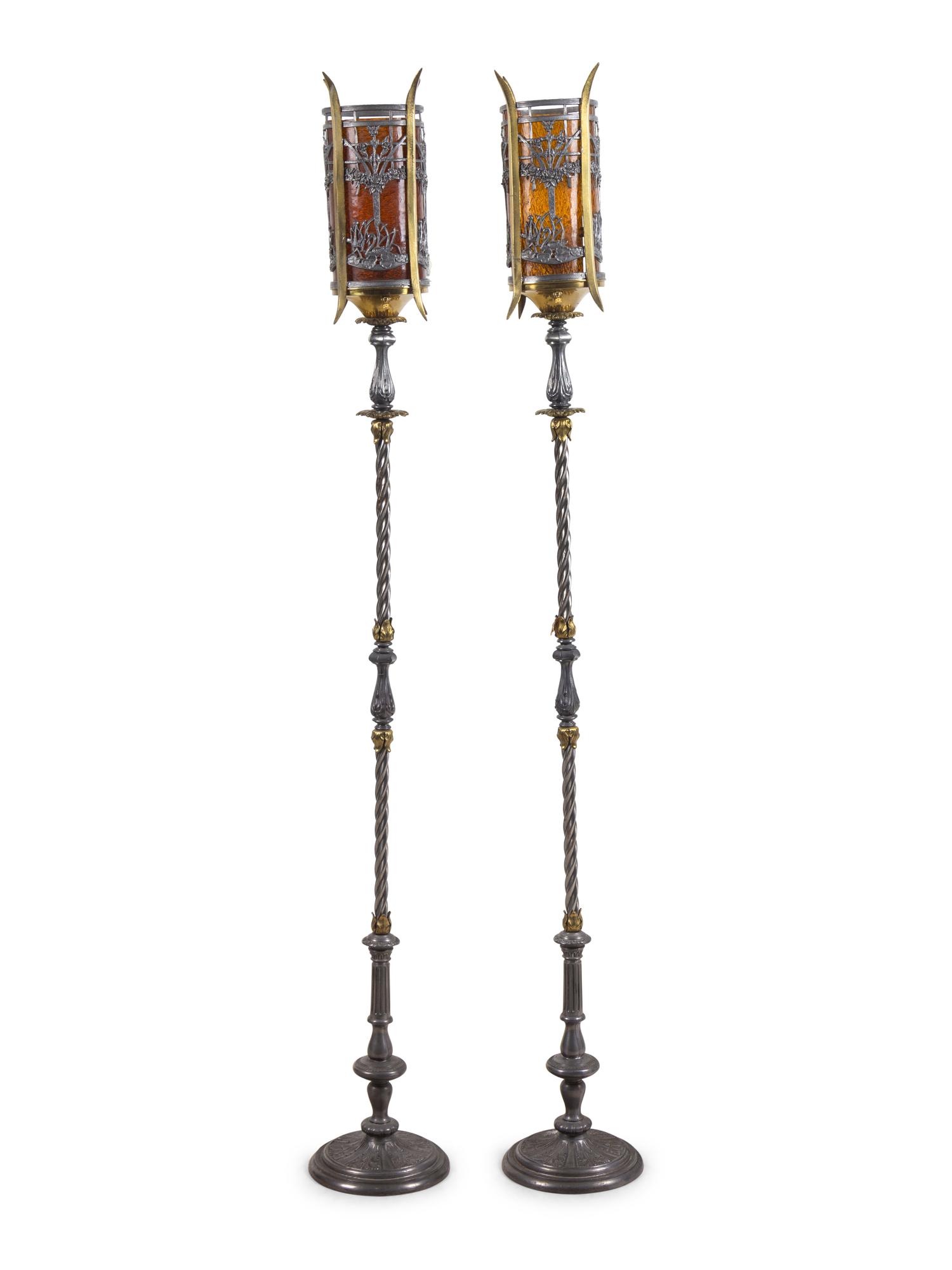 A Pair of Iron and Brass Floor Lamps