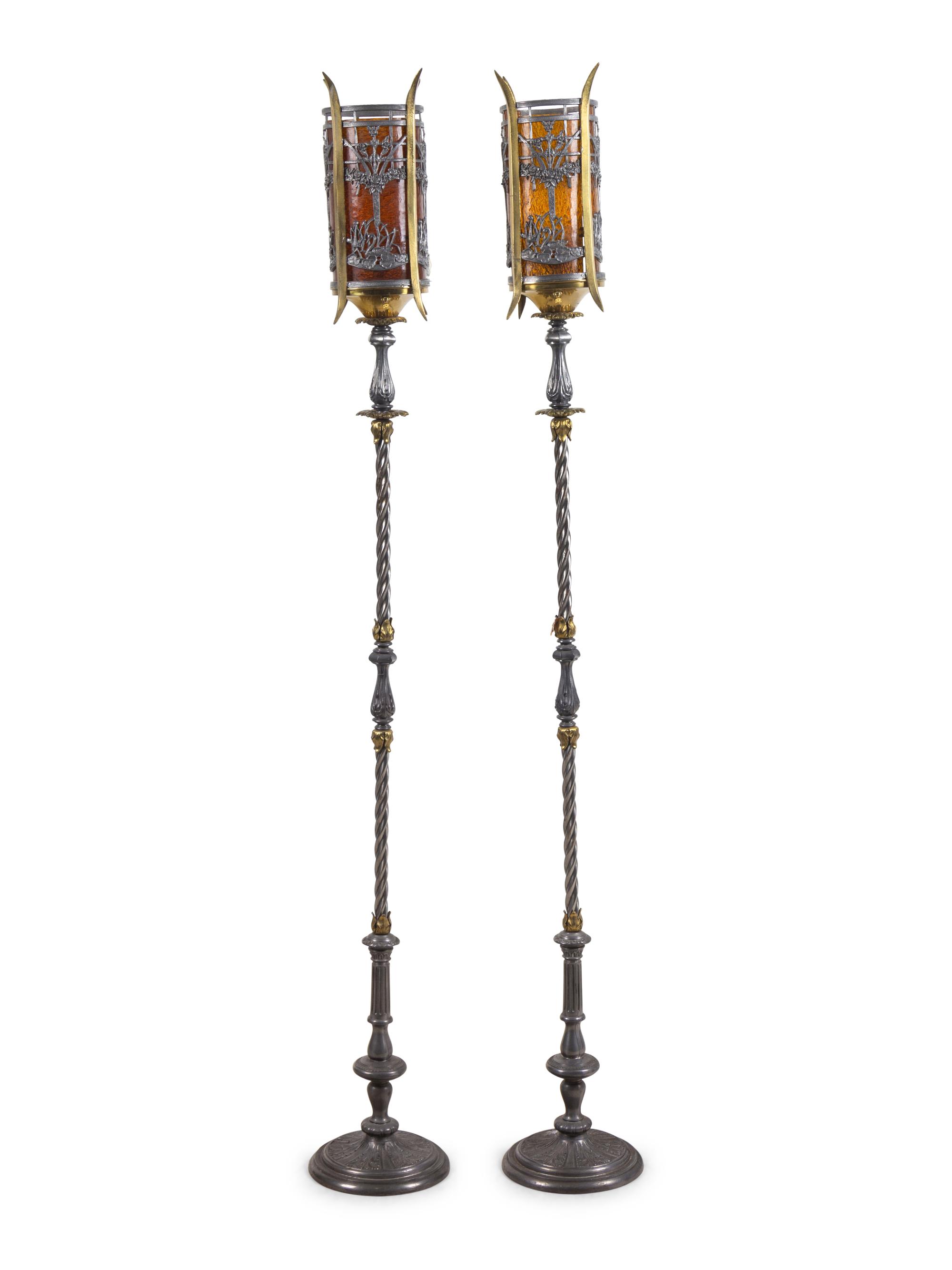 A Pair of Iron and Brass Floor Lamps