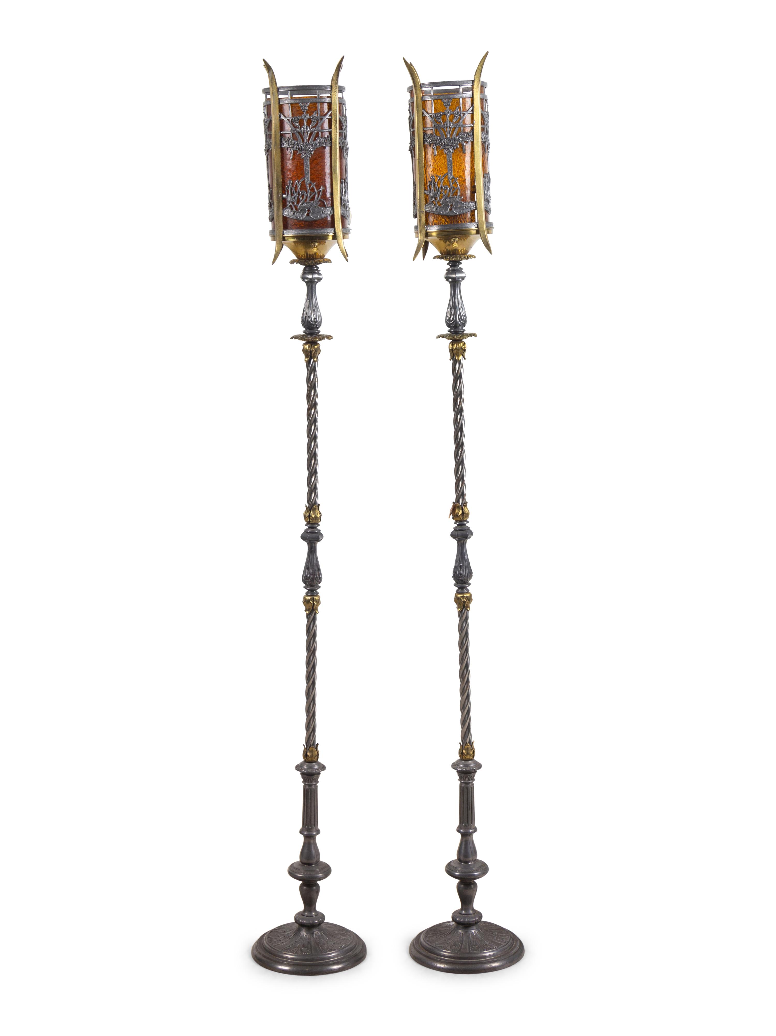 A Pair of Iron and Brass Floor Lamps