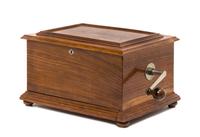 A Swiss Walnut Disk Music Box, STELLA, Height 9 1/2 x width 16 1/2 x depth 11 3/4 inches. — STELLA,