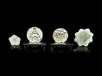 Four Reticulated Celadon Jade Pendants
