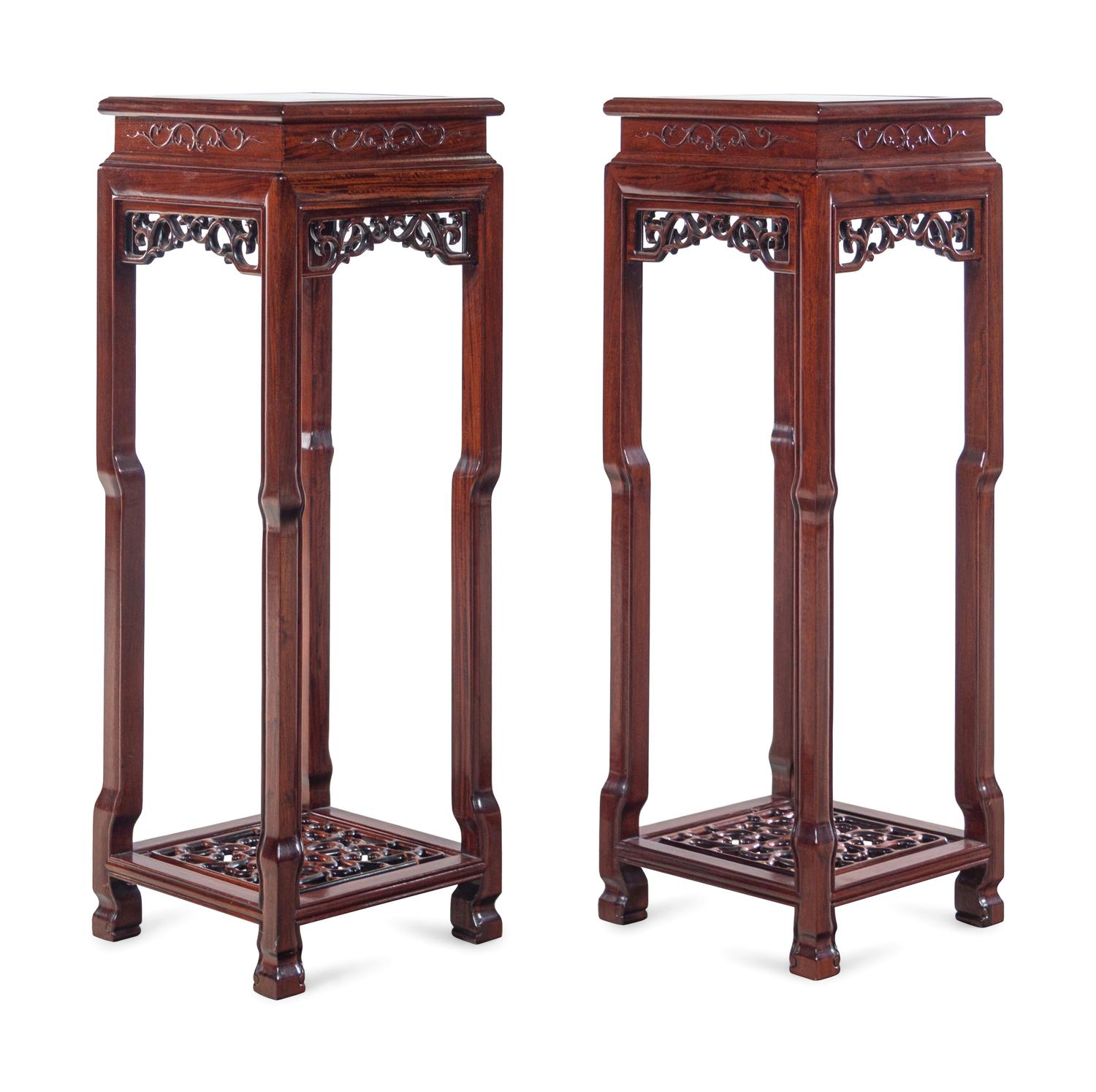 A Pair of Chinese Carved Hardwood Stands