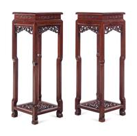A Pair of Chinese Carved Hardwood Stands