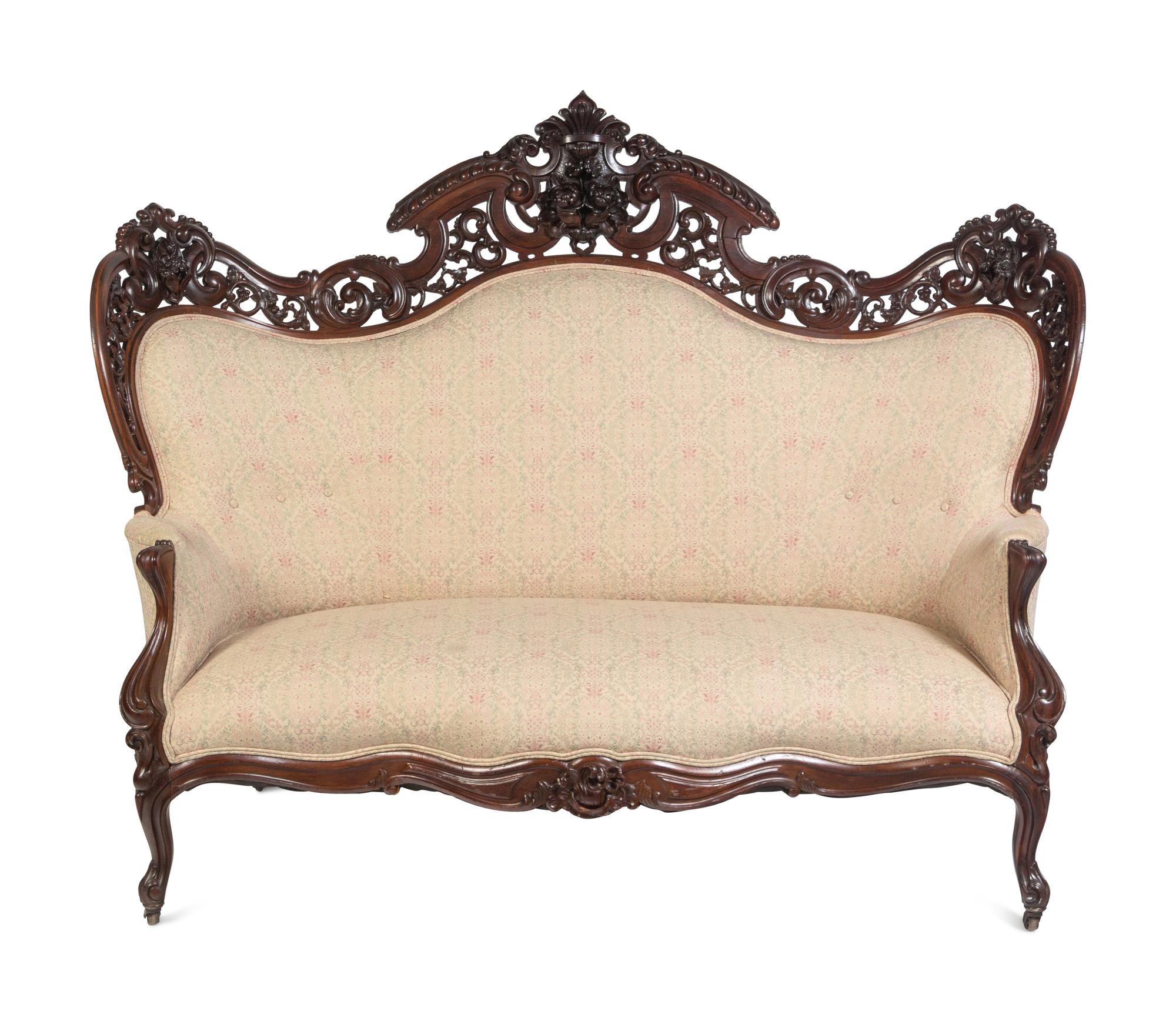 A Joseph Meeks and Sons Carved Rosewood Sofa