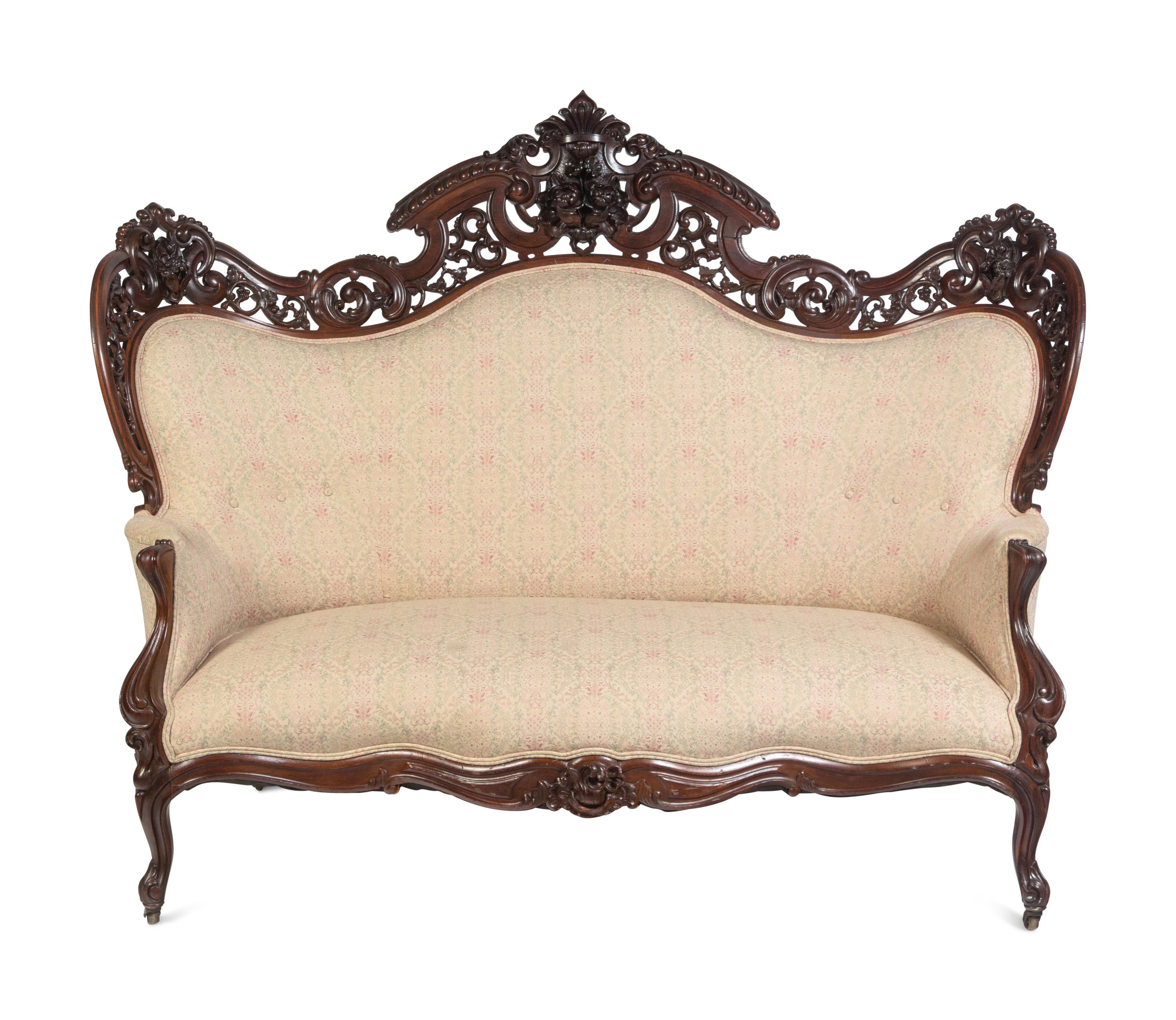 A Joseph Meeks and Sons Carved Rosewood Sofa