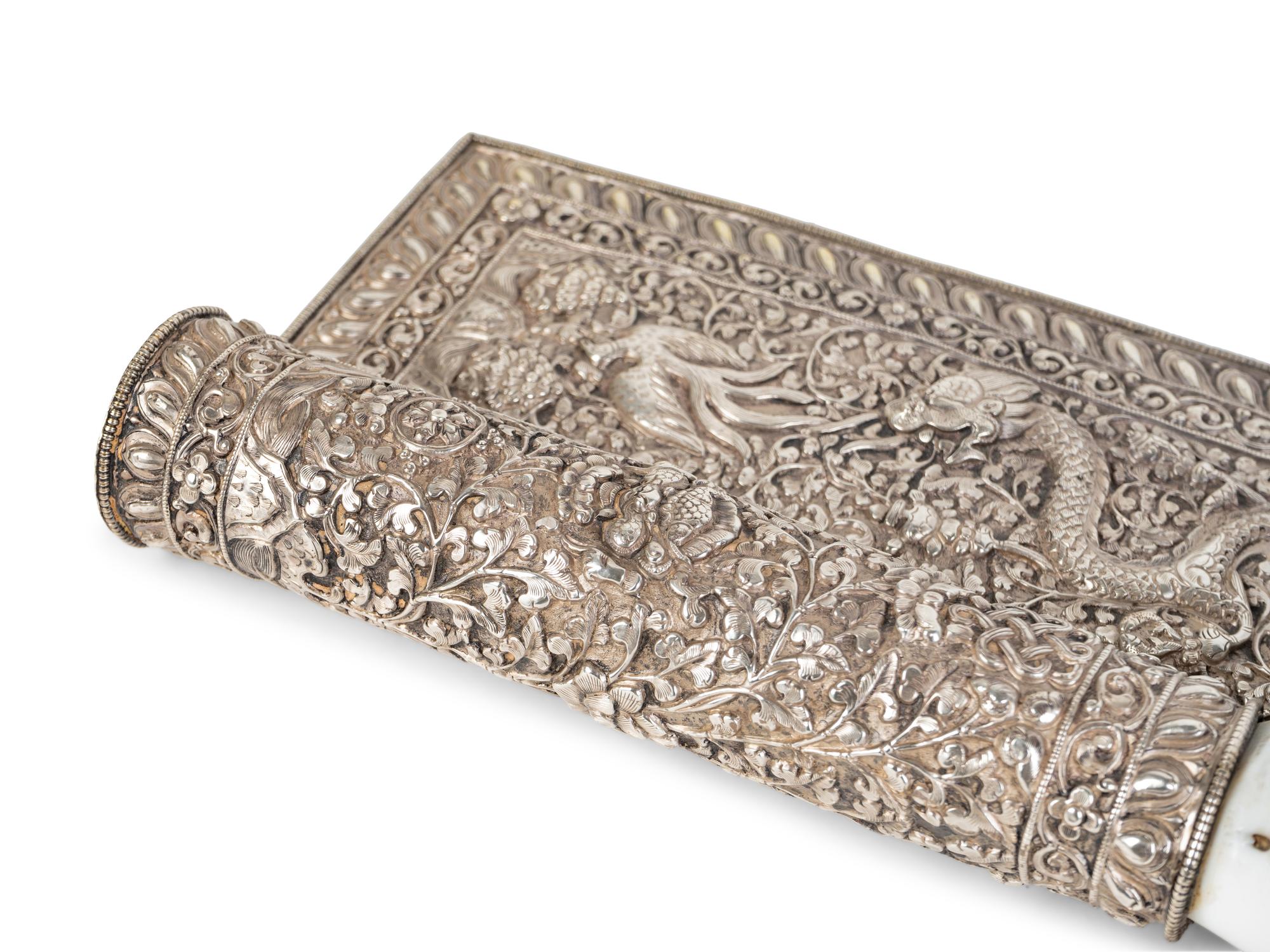 A Tibetan Silvered Metal Mounted and Inscribed Shell Scroll Holder — 19TH CENTURY