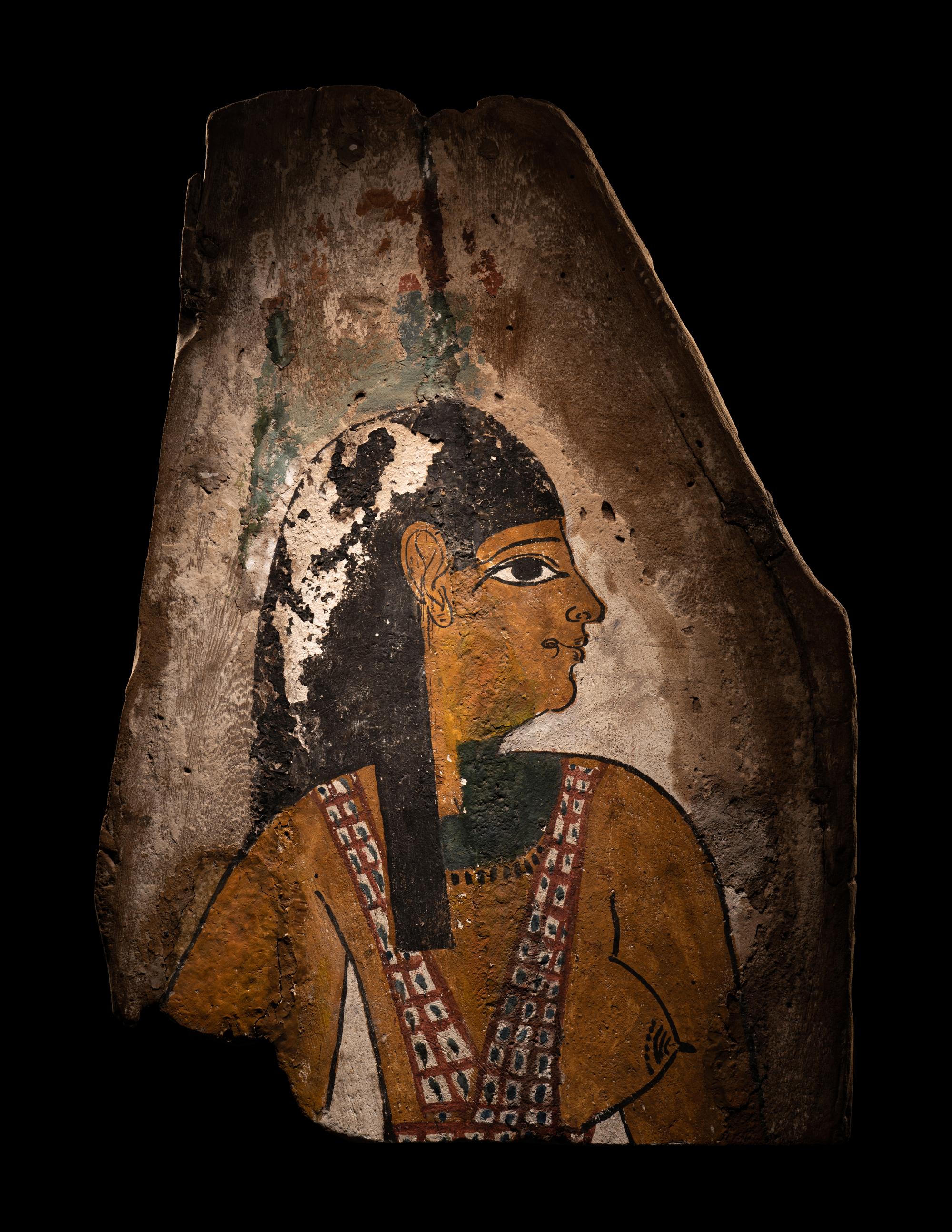 An Egyptian Polychrome Wood Fragment of a Sarcophagus with Isis