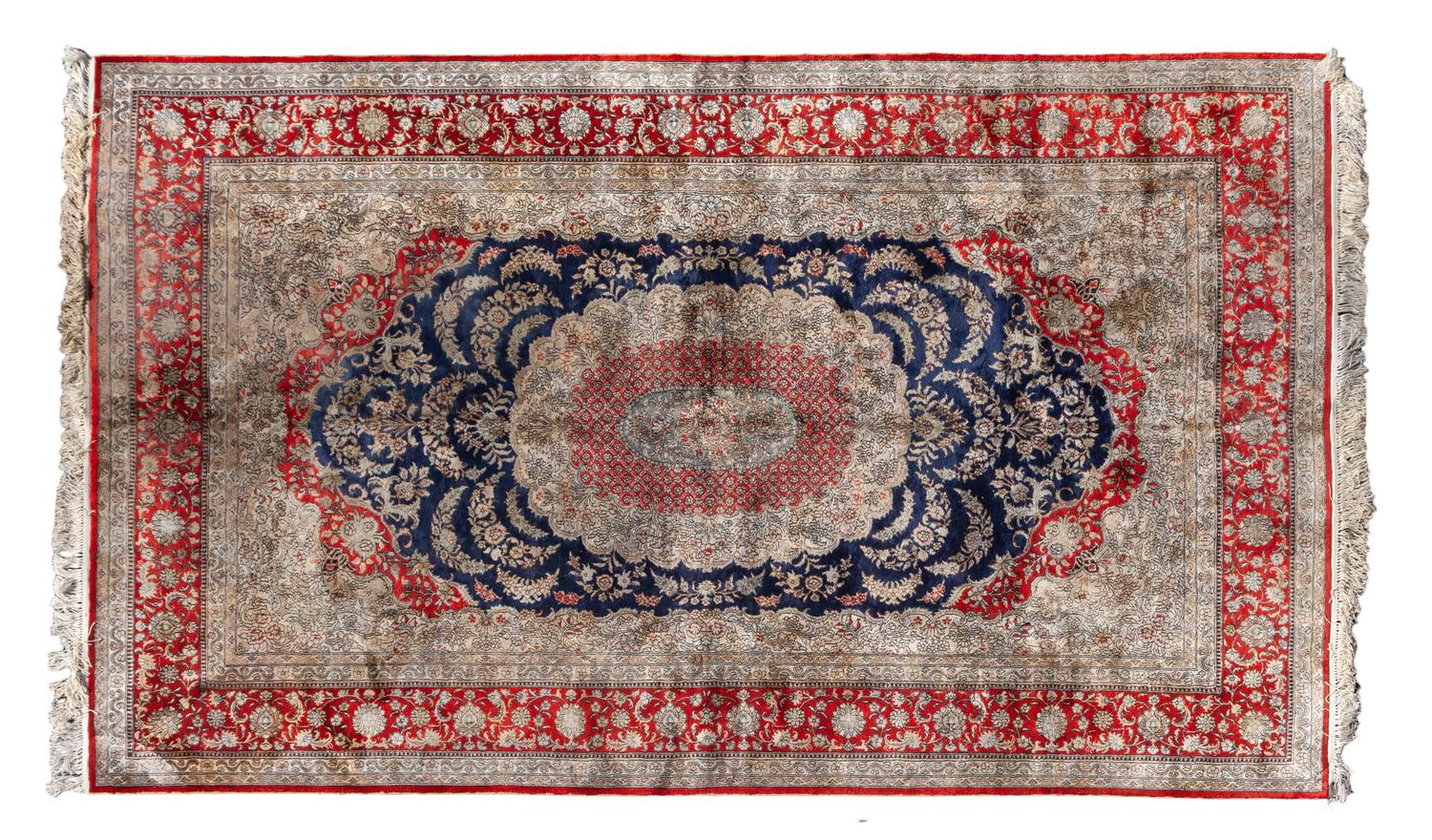A Sino-Persian Silk Rug 8 feet 1 inch x 5 feet. — 20TH CENTURY