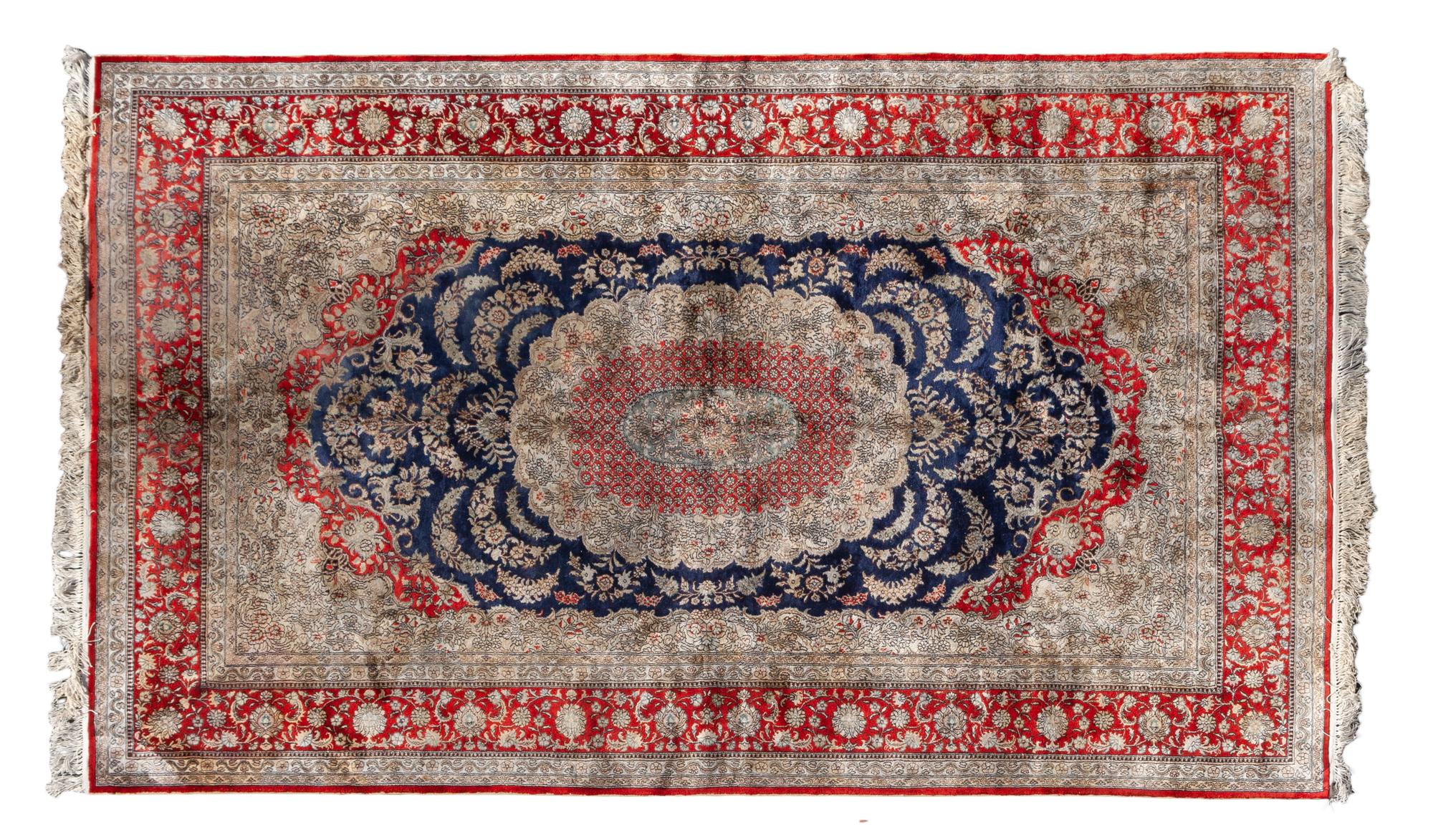 A Sino-Persian Silk Rug 8 feet 1 inch x 5 feet. — 20TH CENTURY