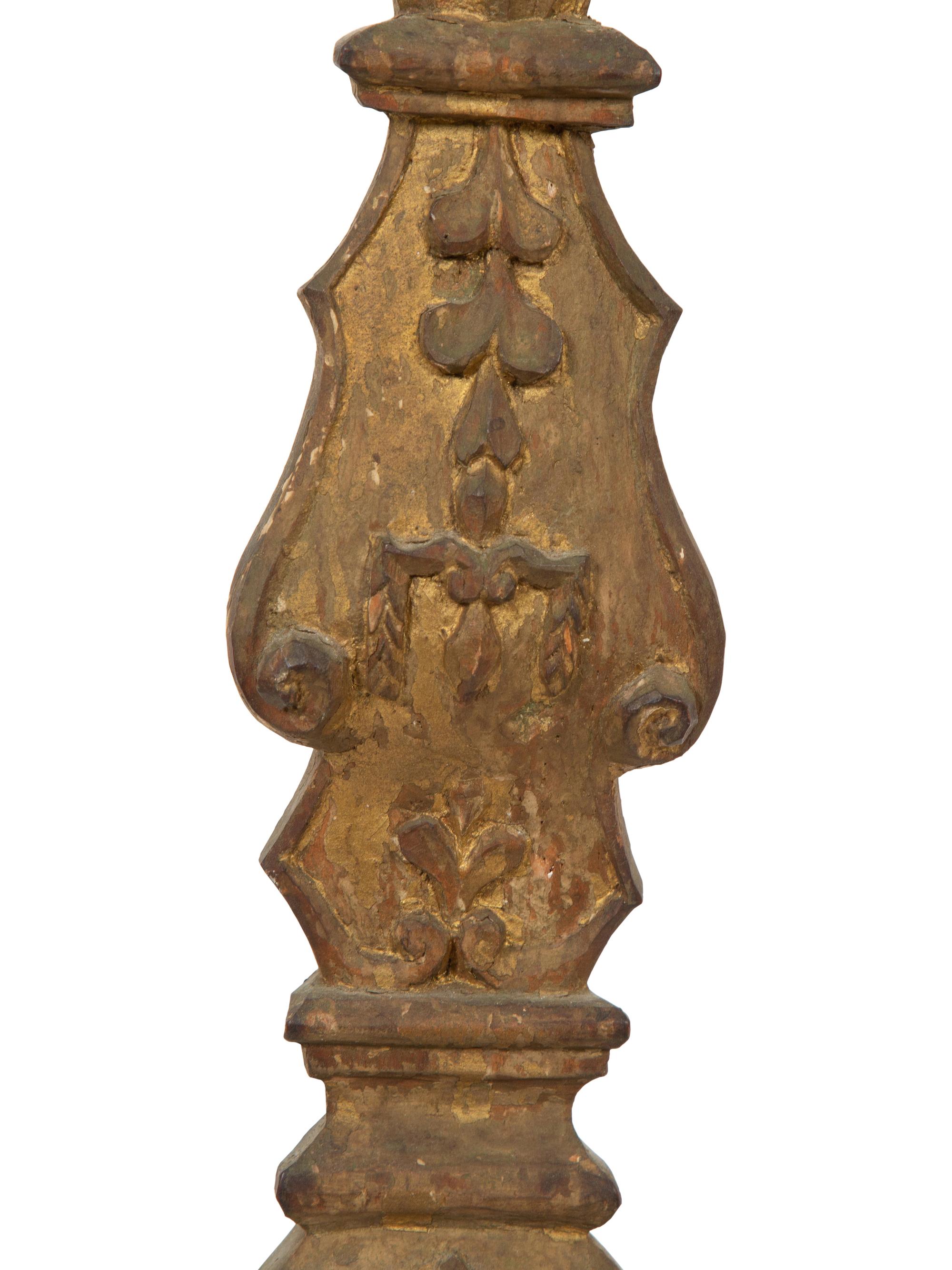A Pair of Italian Baroque Style Carved Giltwood Pricket Sticks