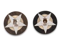 An Associated Pair of Arno Malinowski for Georg Jensen Silver and Ebony Christmas Candle Holders
