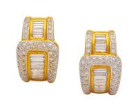 A Pair of 18 Karat Yellow Gold and Diamond Earclips,