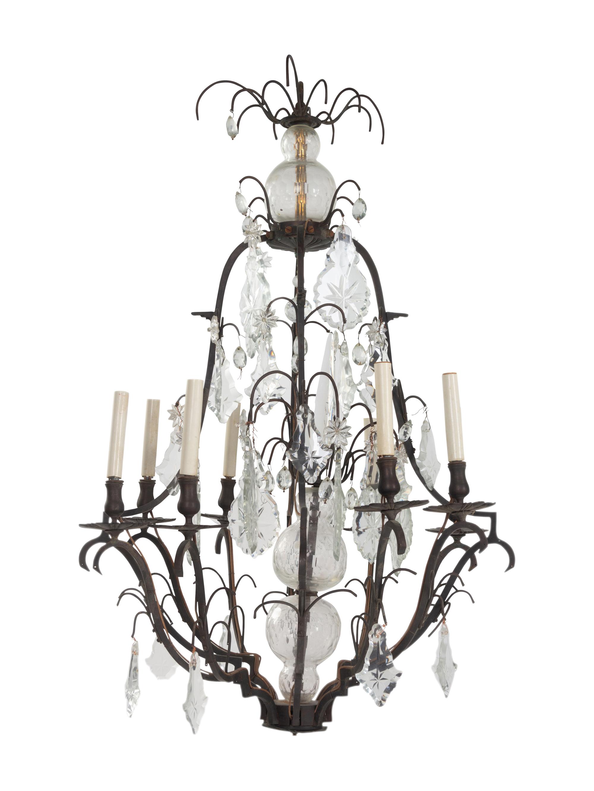 A Continental Cast Metal and Cut Glass Eight-Light Chandelier