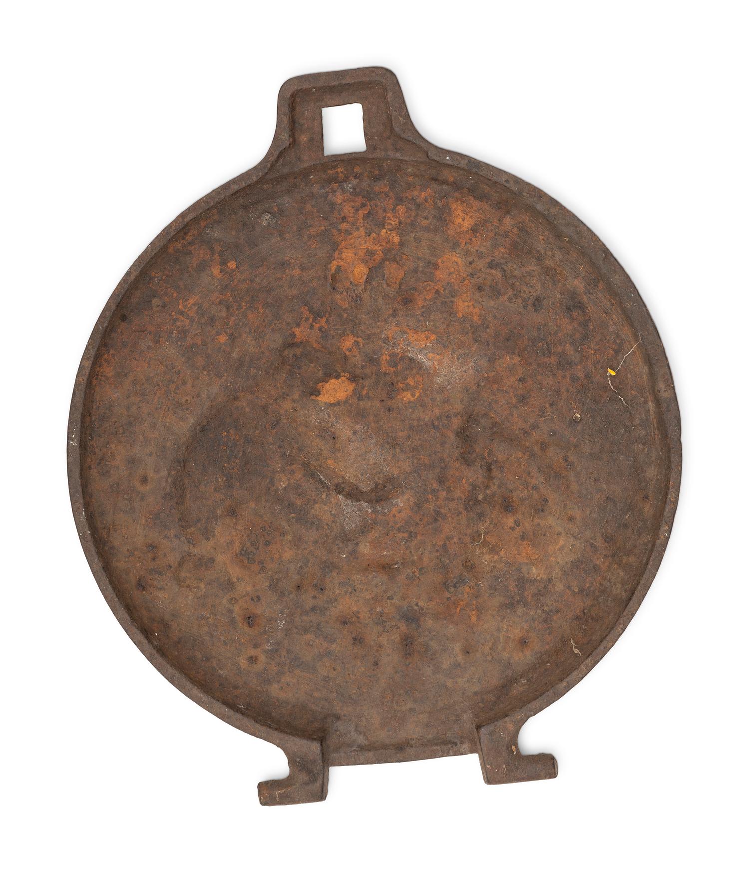 A Pair of Cast Iron Kettle Toppers and Two Trivets