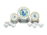An Hermès Porcelain Toucans Porcelain Dinner Service