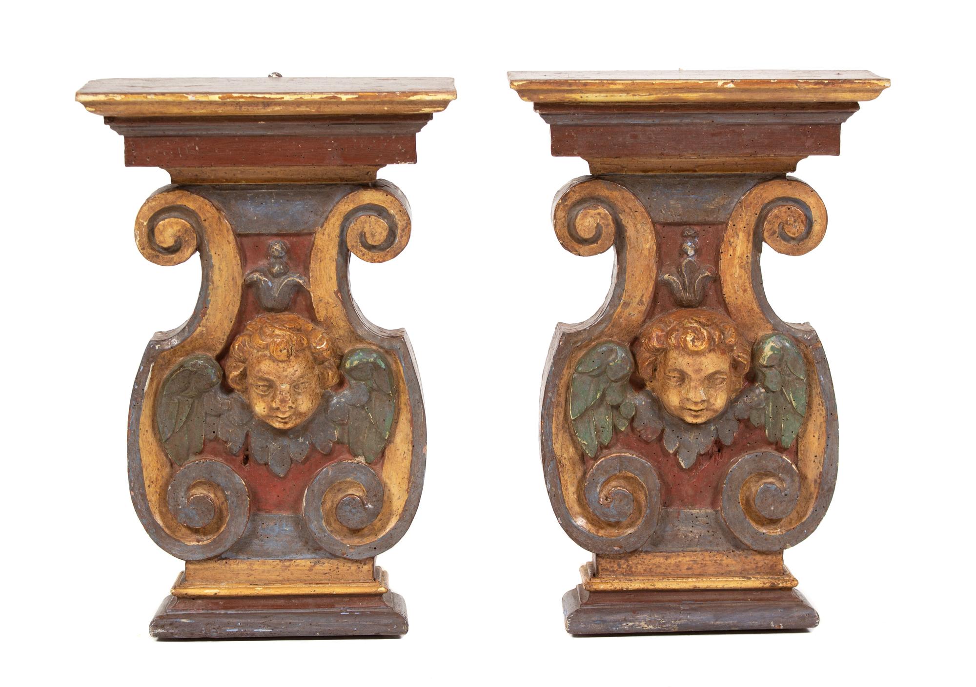 A Pair of Italian Carved and Polychromed Wood Wall Brackets Height 18 1/2 inches. — 19TH CENTURY