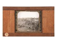 [CIVIL WAR]. GARDNER, Alexander, photographer. A group of 2 images of fallen Confederate soldiers at Antietam, including stereoview and magic lantern slide. Hartford, CT: Taylor & Huntington.