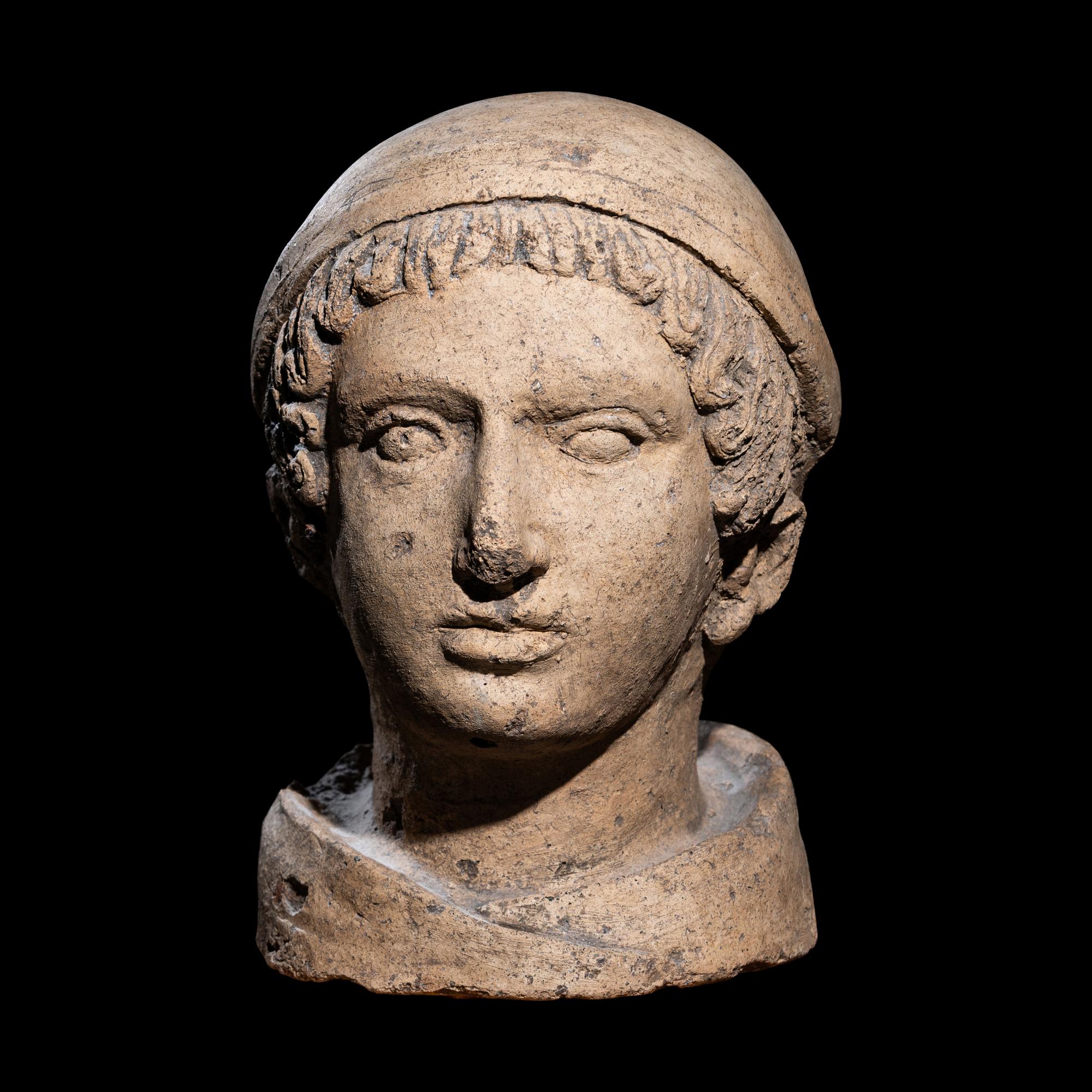 An Etruscan Terracotta Head of a Youth