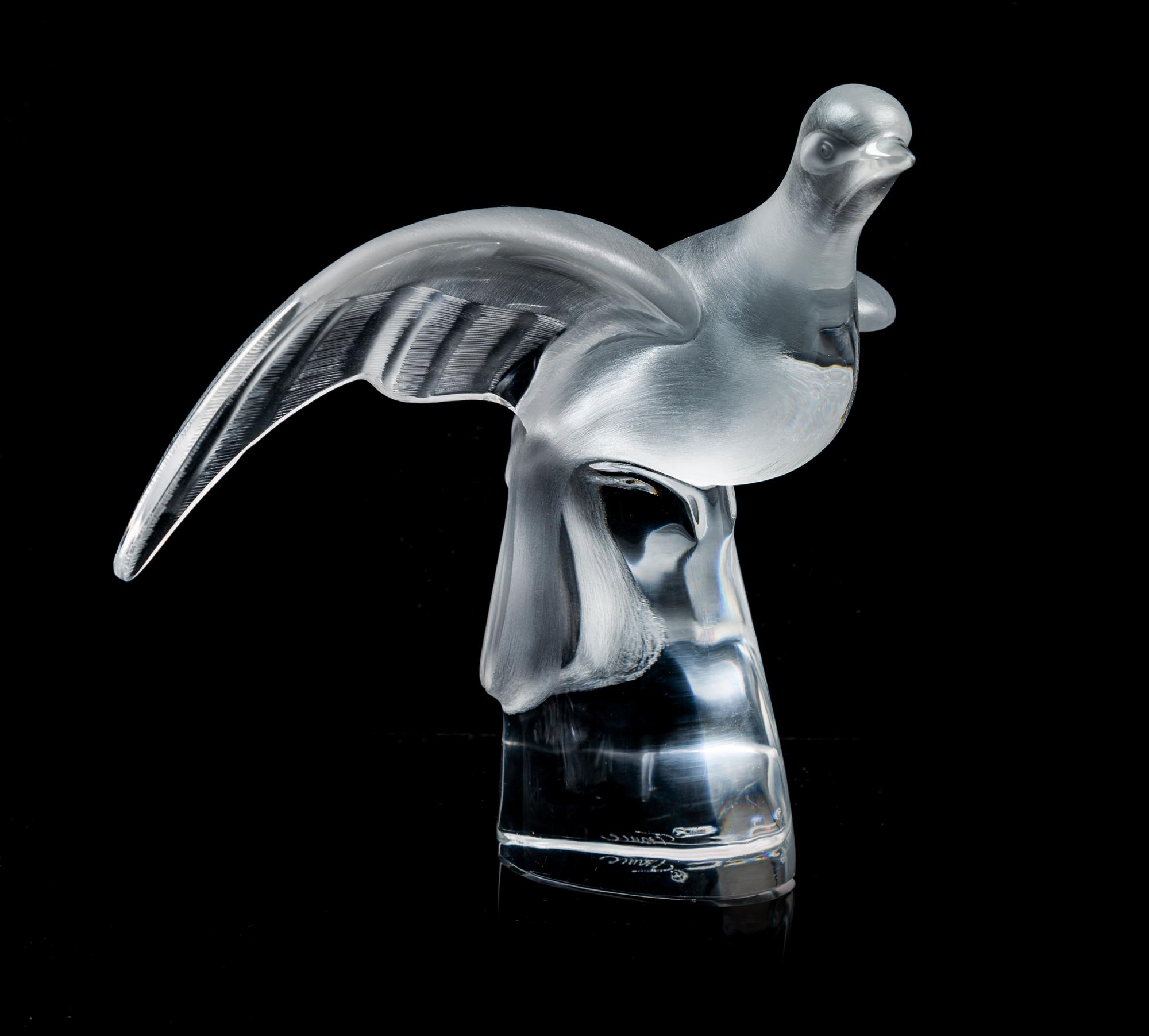 A Lallique Dove Width 12 1/2 inches.