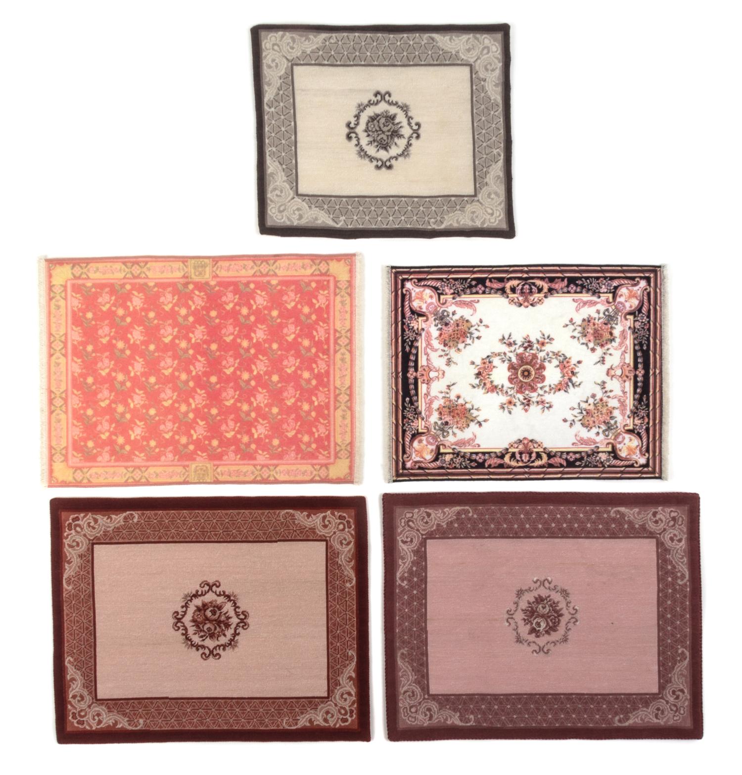 A Group of Five Rugs Largest 12 1/4 x 9 1/2 inches.