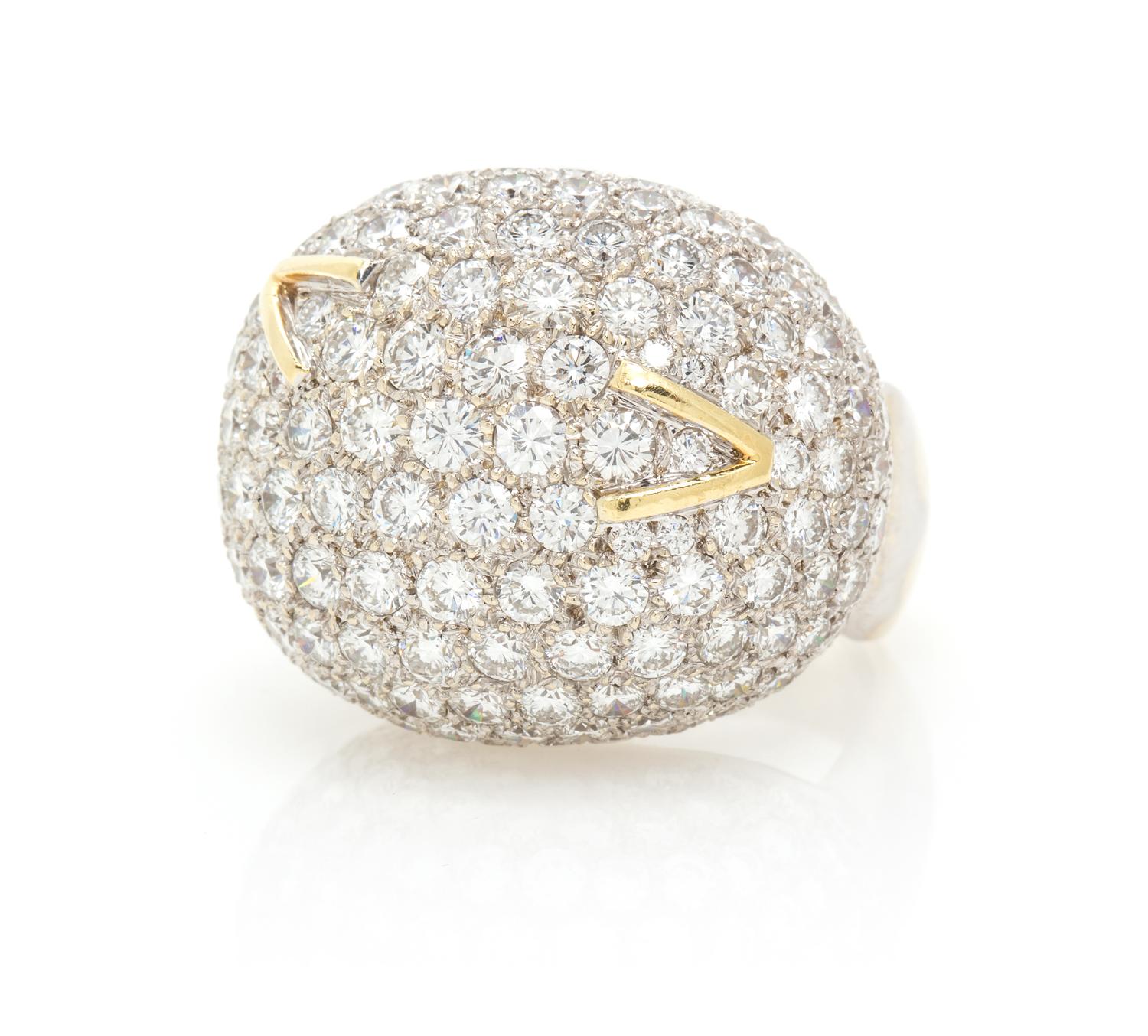 An 18 Karat Gold and Diamond Bombe Ring, 17.60 dwts.