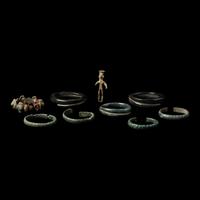 Eight European Bronze Armlets, Bracelets and a Figure