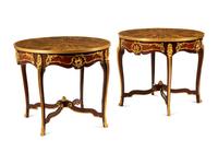 A Pair of Louis XV Style Gilt Bronze Mounted Gueridons with Tiger's Eye Tops