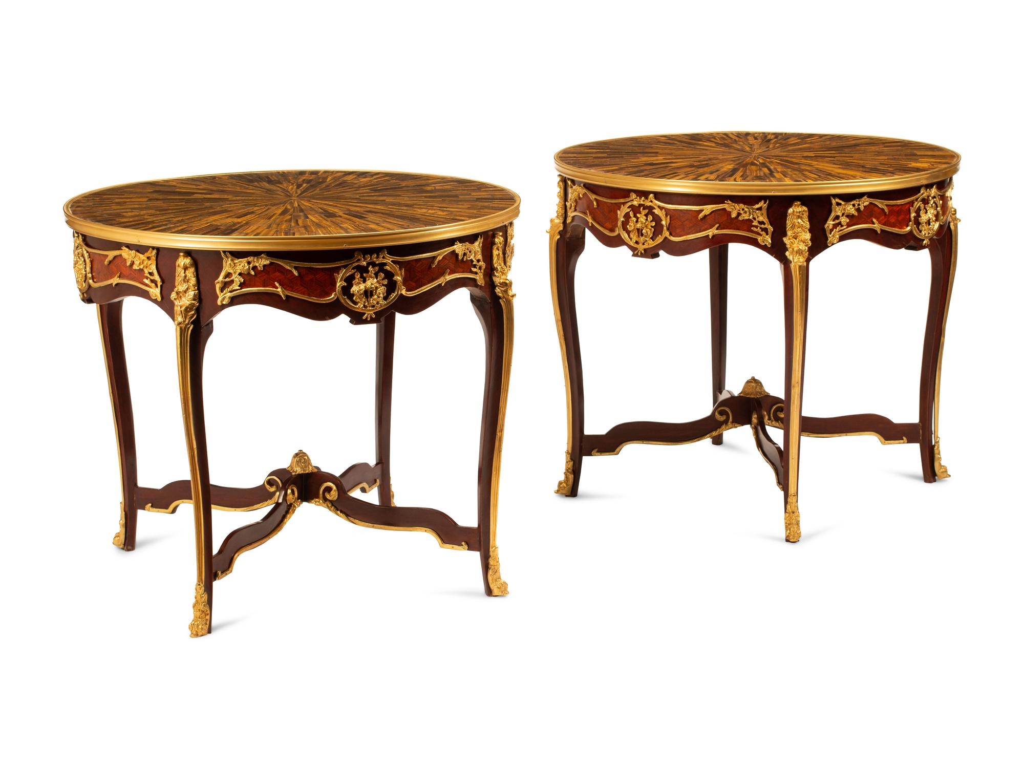 A Pair of Louis XV Style Gilt Bronze Mounted Gueridons with Tiger's Eye Tops