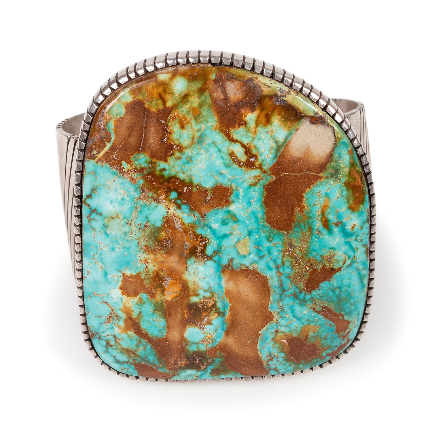 A Large Sterling Silver and Blue Gem Turquoise Cuff Bracelet