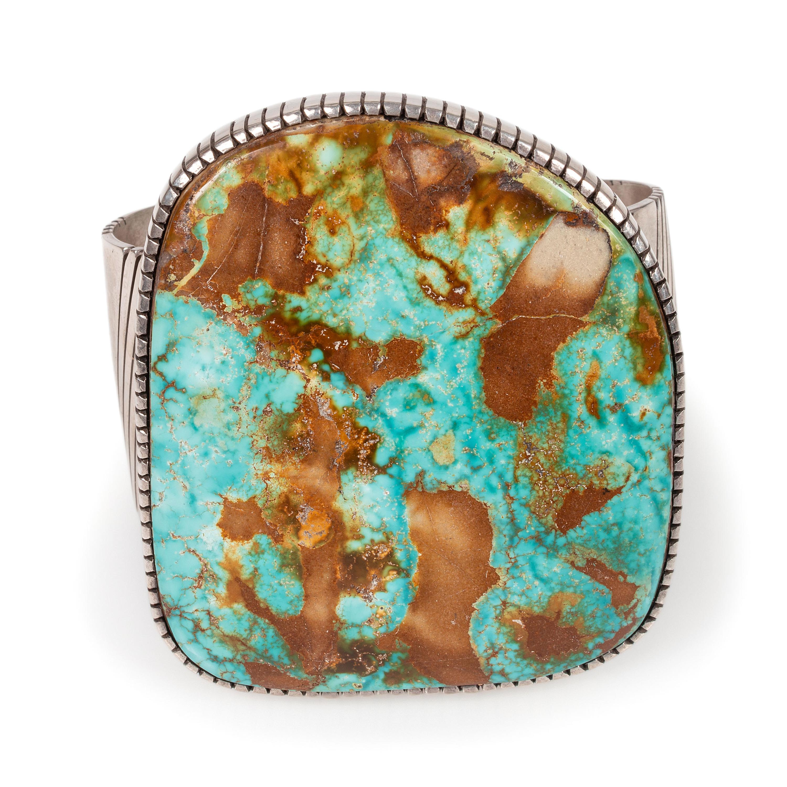 A Large Sterling Silver and Blue Gem Turquoise Cuff Bracelet