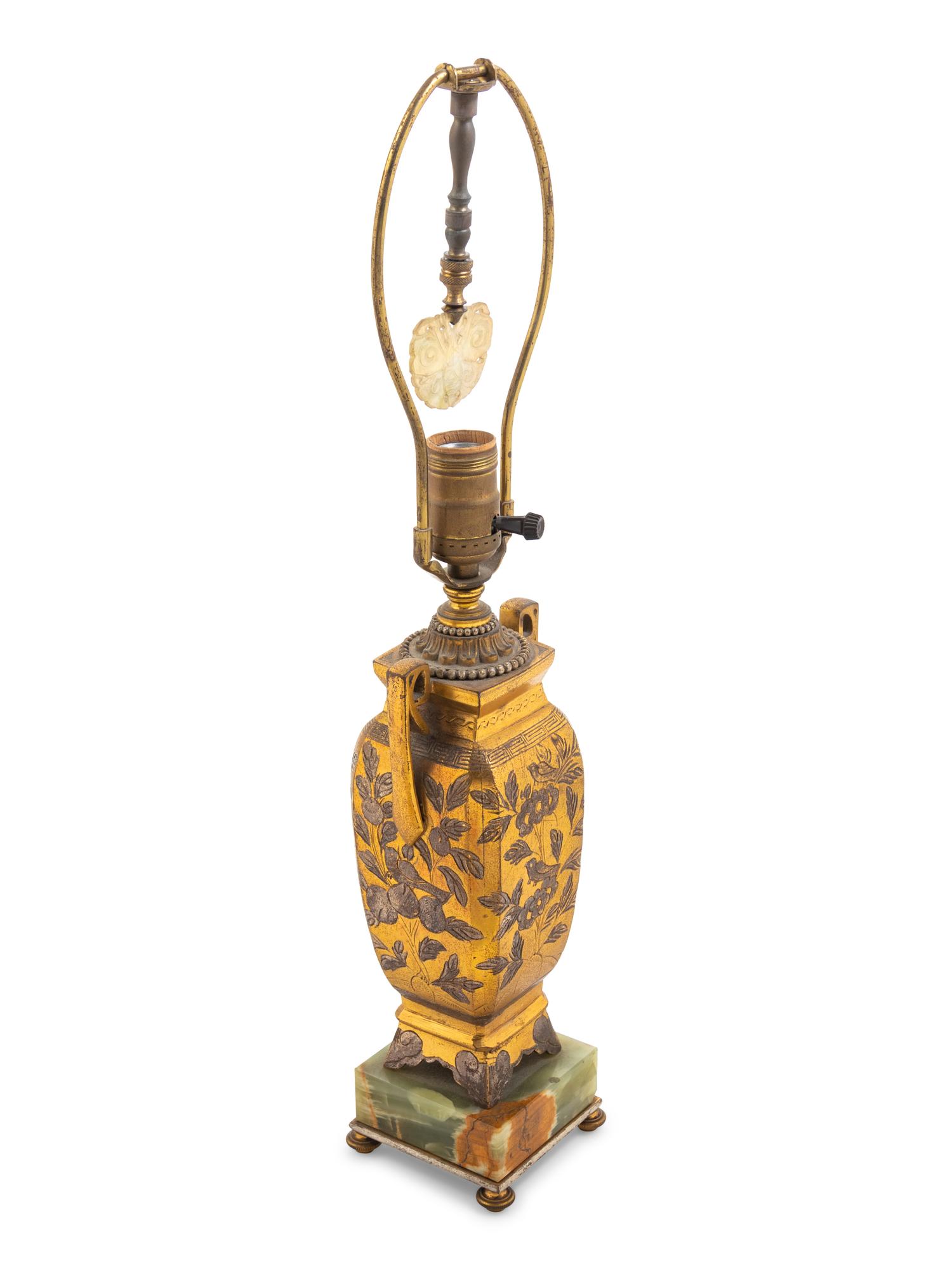 A Bronze and Onyx Mounted Lamp