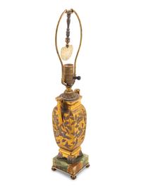 A Bronze and Onyx Mounted Lamp
