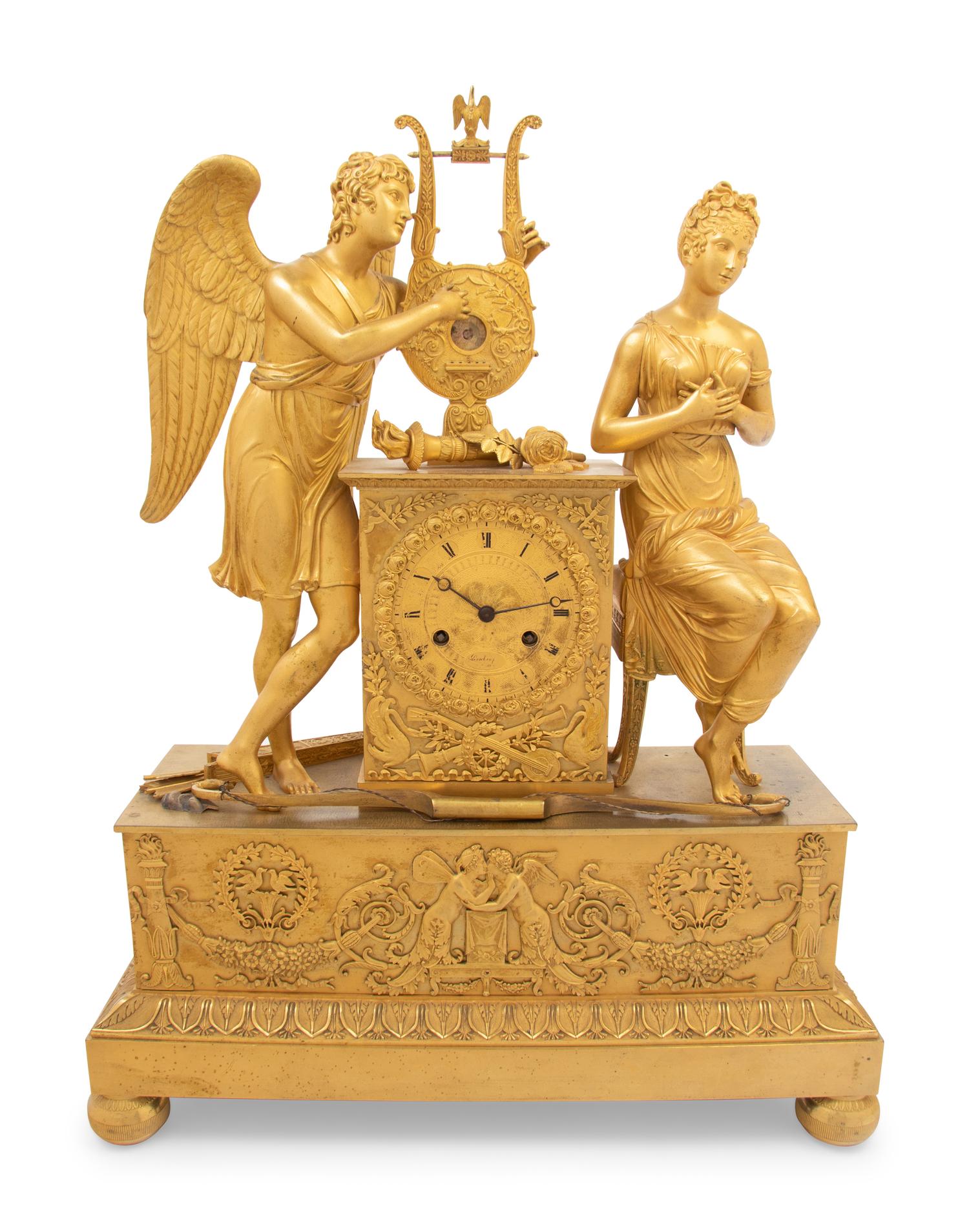 An Empire Gilt Bronze Figural Mantel Clock