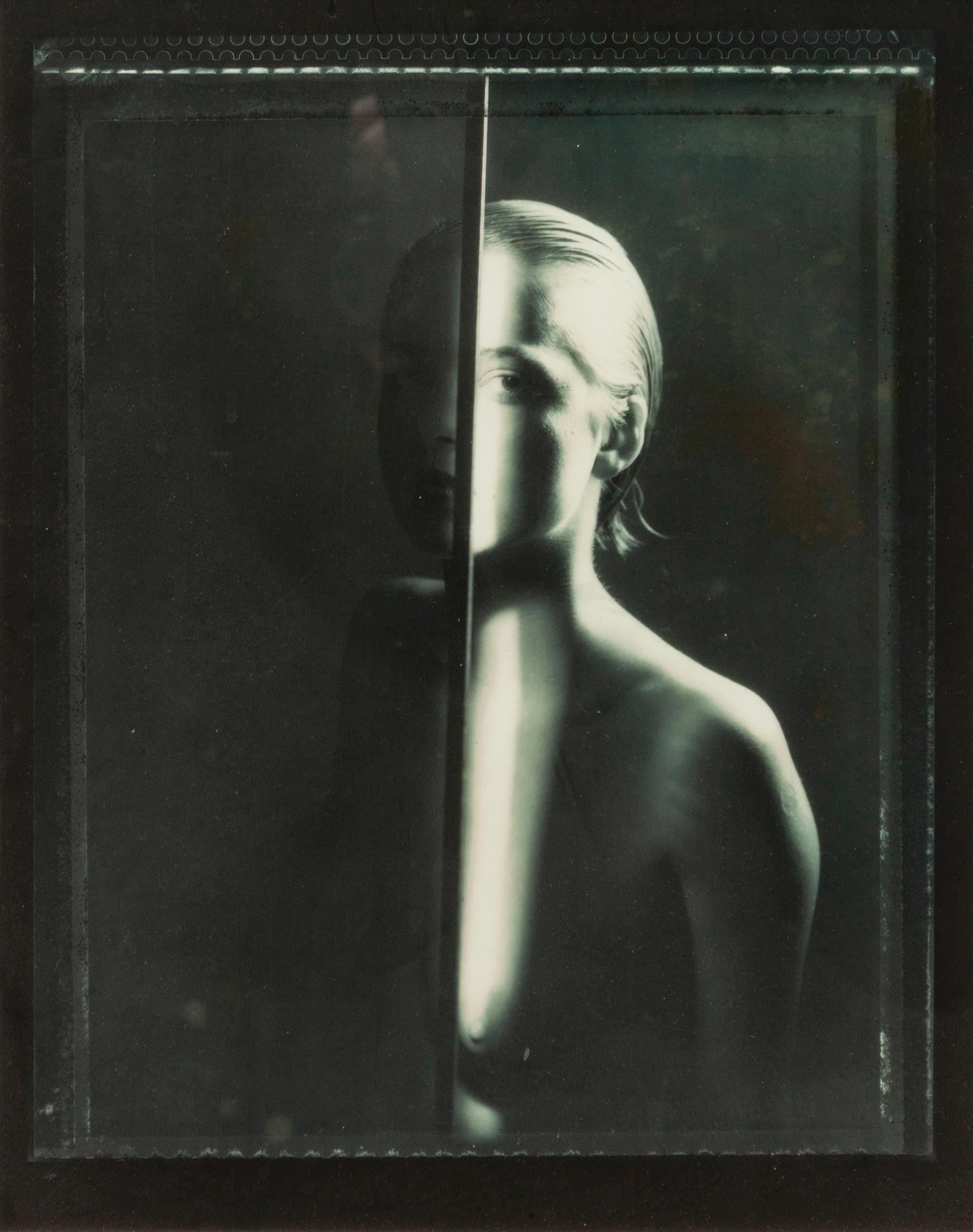 A group of four photographs ( Portrait with Metal Bar , 1984; Nude with Metal Arch , 1985; Touching , 1986; Untitled , 1985)