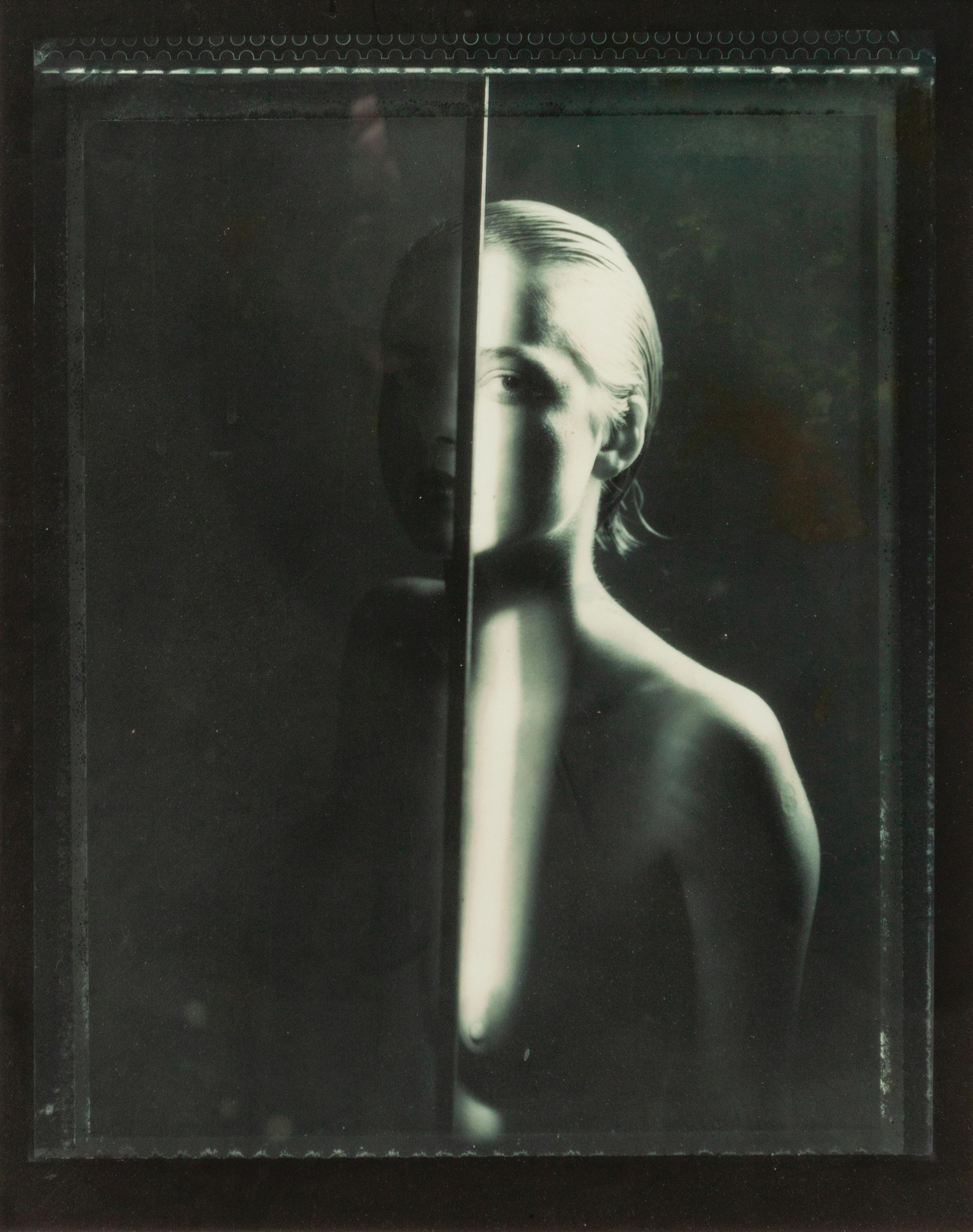 A group of four photographs ( Portrait with Metal Bar , 1984; Nude with Metal Arch , 1985; Touching , 1986; Untitled , 1985)