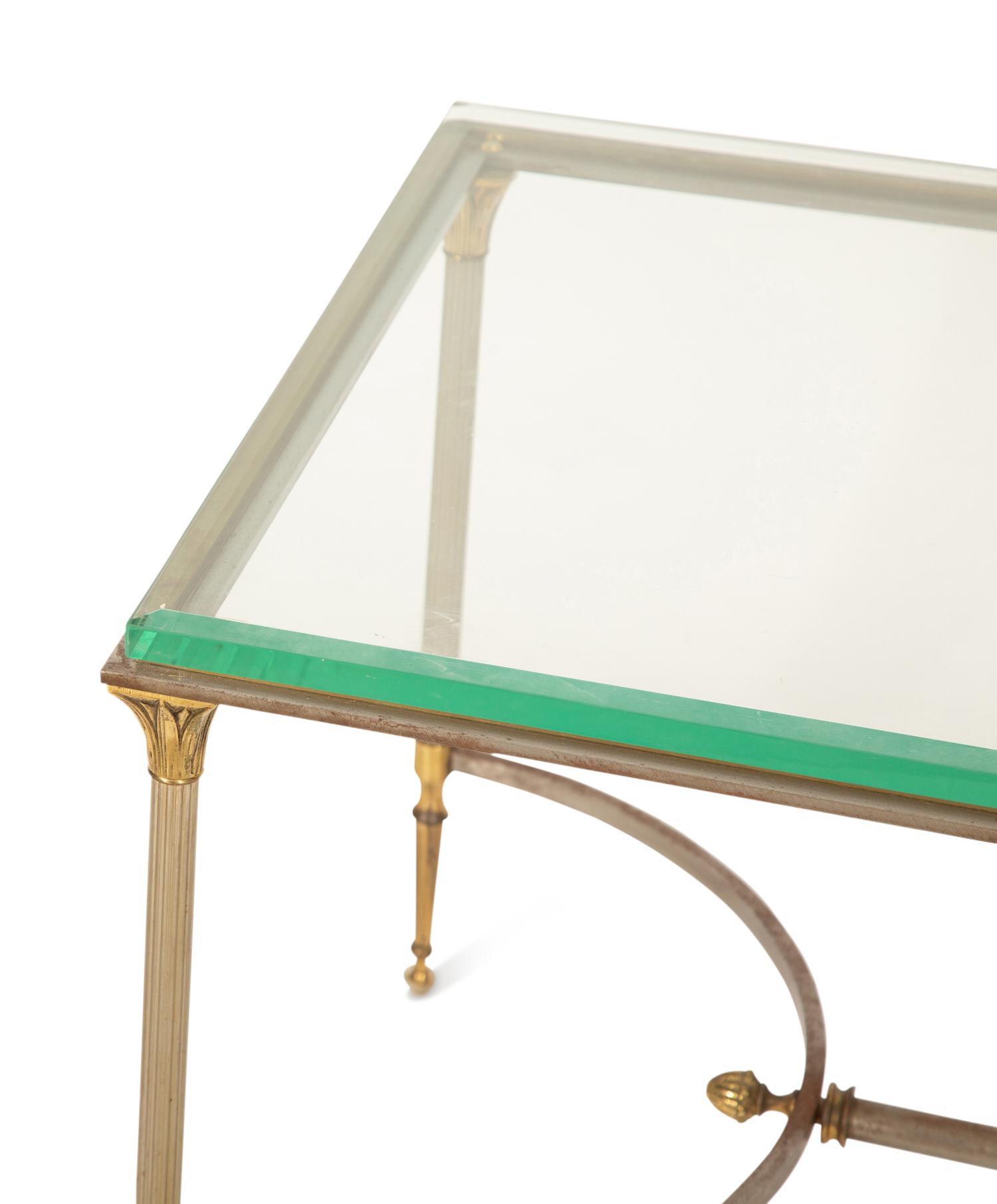 A Neoclassical Style Steel and Brass Glass Top Coffee Table in the Manner of Maison Jansen