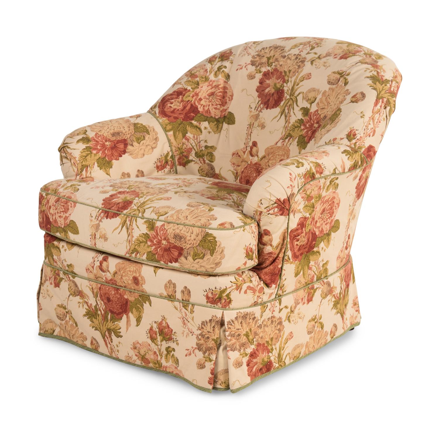 Two Chintz Slip-Covered Armchairs and an Ottoman