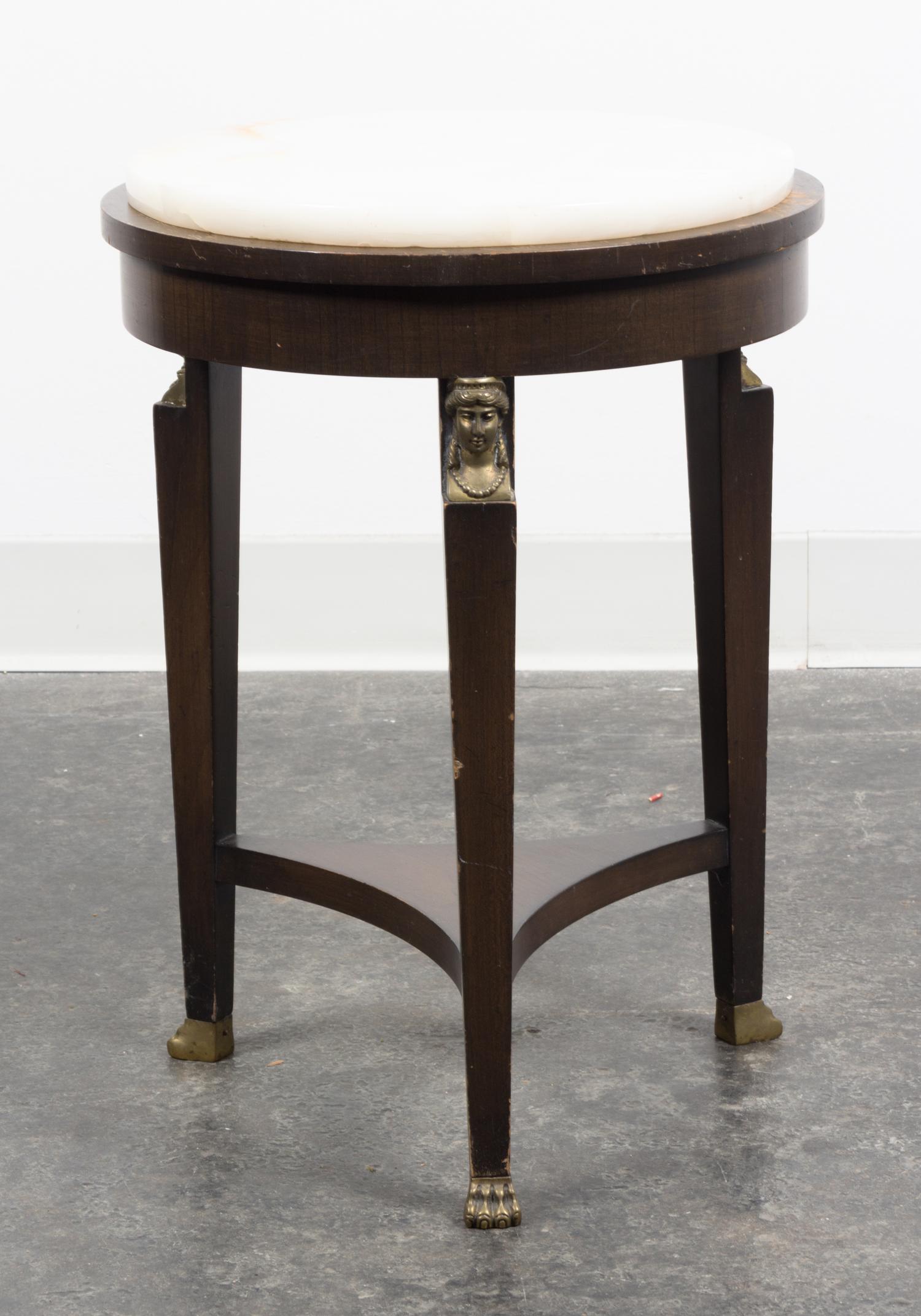 An Empire Style Gilt Metal Mounted Mahogany Table Height 20 1/2 inches.