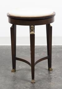 An Empire Style Gilt Metal Mounted Mahogany Table Height 20 1/2 inches.