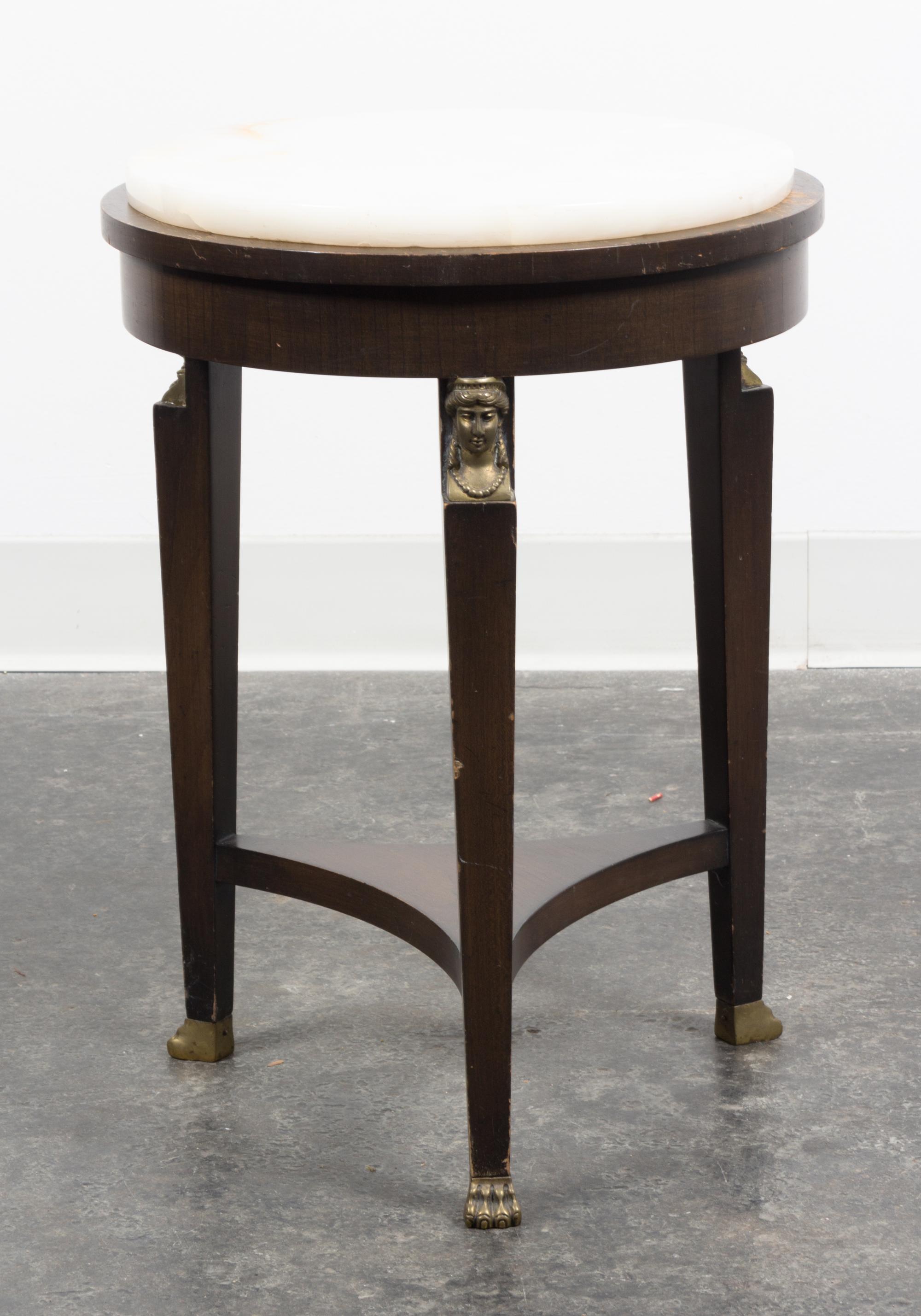 An Empire Style Gilt Metal Mounted Mahogany Table Height 20 1/2 inches.