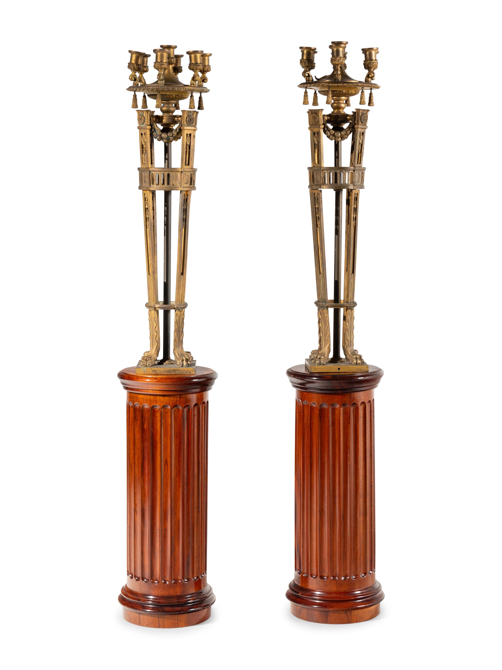 A Pair of Neoclassical Gilt Bronze Seven-Light Candelabra