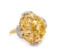 An 18 Karat Yellow Gold, Platinum, Yellow Sapphire and Diamond Ring, 9.70 dwts.