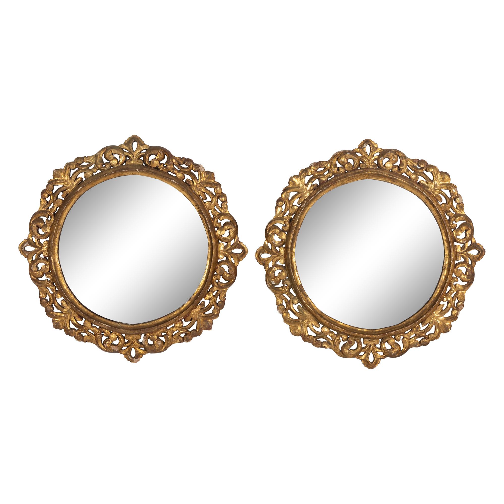 A Pair of Continental Giltwood Mirrors